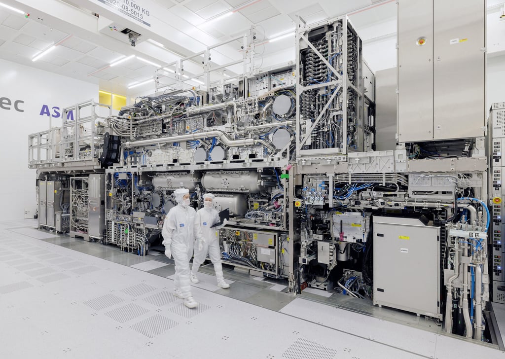 ASML engineers walk past a High NA EUV tool at ASML’s headquarters in the Netherlands, November 20, 2023. Photo: Handout via Reuters ASML engineers walk past a High NA EUV tool at ASML’s headquarters in the Netherlands, November 20, 2023. Photo: Handout via Reuters