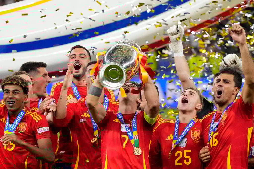 Spain’s Alvaro Morata lifts the trophy after winning the final match against England at Euro 2024. The force conducted 165 raids targeting illegal bookmakers across the city. Photo: AP Spain’s Alvaro Morata lifts the trophy after winning the final match against England at Euro 2024. The force conducted 165 raids targeting illegal bookmakers across the city. Photo: AP