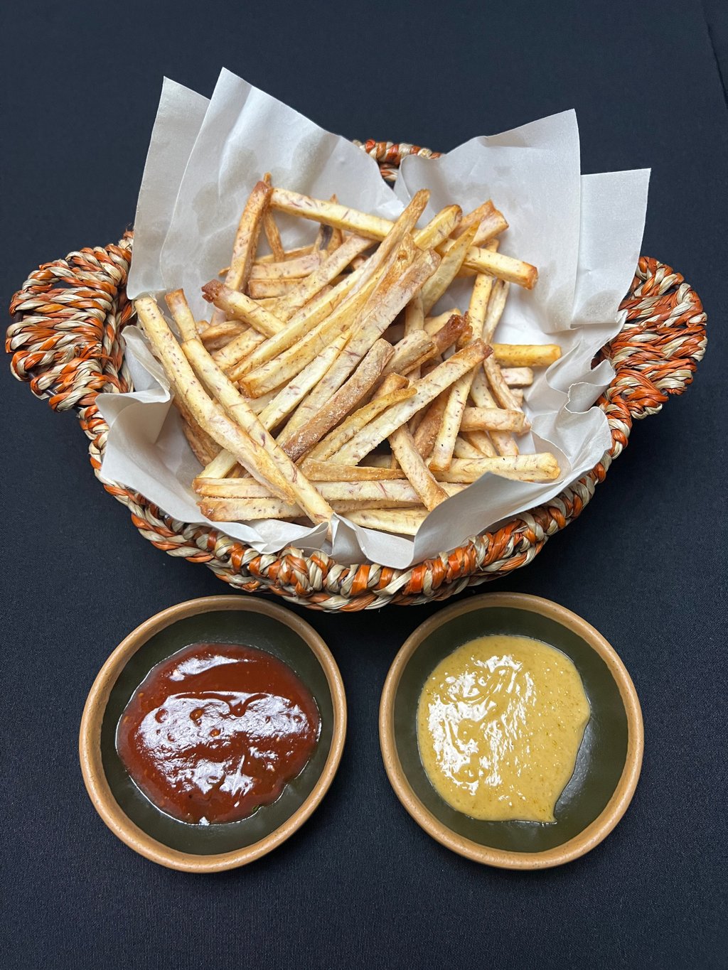 Five venom fries are made from taro and served with house-made ketchup and mayonnaise. Photo: Far East Descendant Five venom fries are made from taro and served with house-made ketchup and mayonnaise. Photo: Far East Descendant