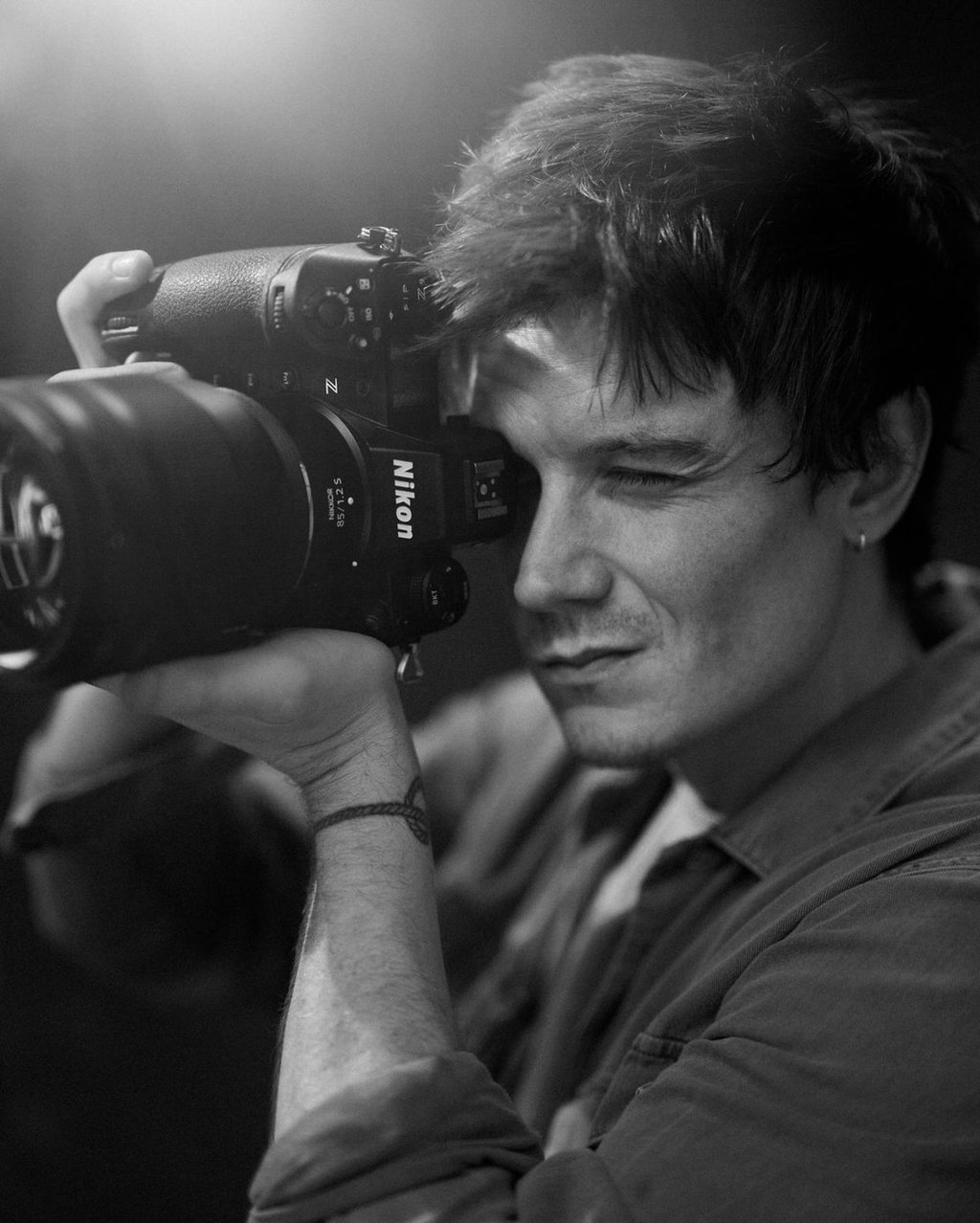 Ben Seed behind the lens of a Nikon camera. Photo: @bypip/Instagram Ben Seed behind the lens of a Nikon camera. Photo: @bypip/Instagram