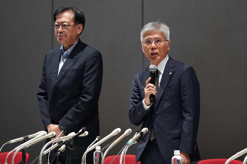 Japan Gymnastics Association President Tadashi Fujita (right) apologised after Shoko Miyata was sent home from the Paris Olympics over allegations of smoking. Photo: AFP