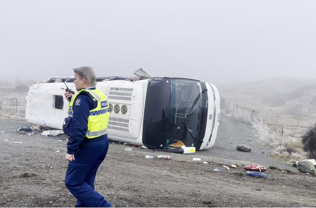 A police officer at the site of one of the bus crashes on New Zealand’s South Island on Thursday. Photo: Xinhua