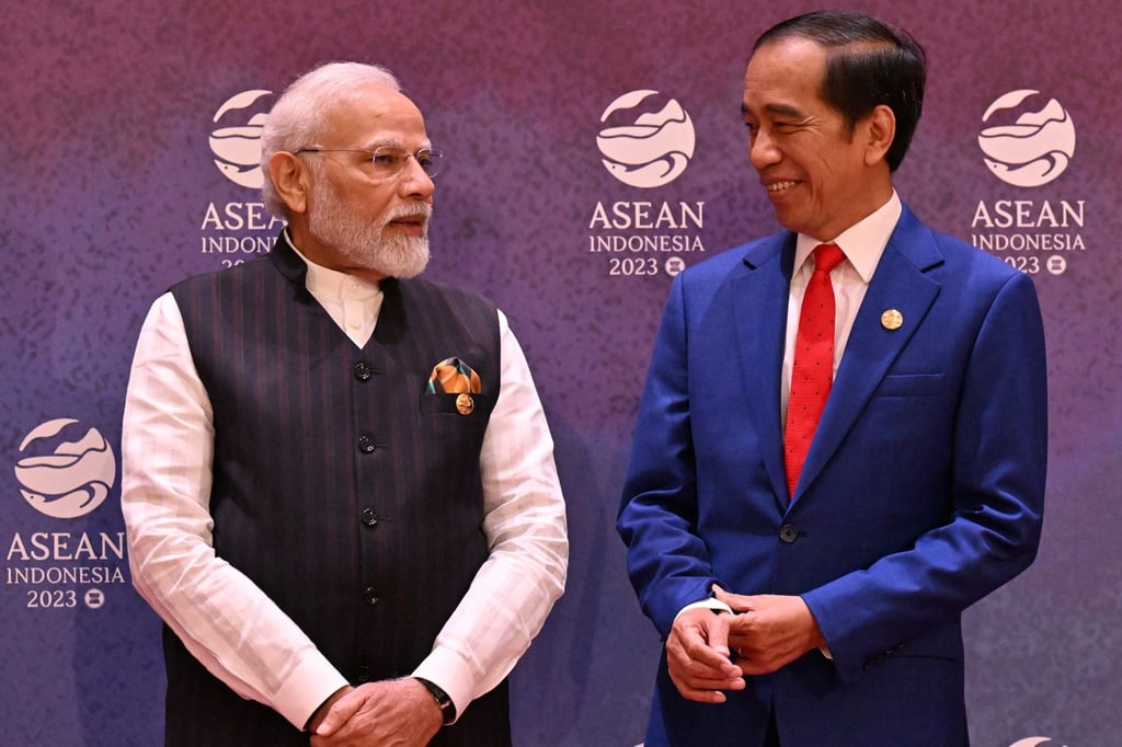 Indian Prime Minister Narendra Modi speaks to Indonesia’s outgoing President Joko Widodo at the 20th Asean-India Summit in Jakarta last year. Photo: AFP