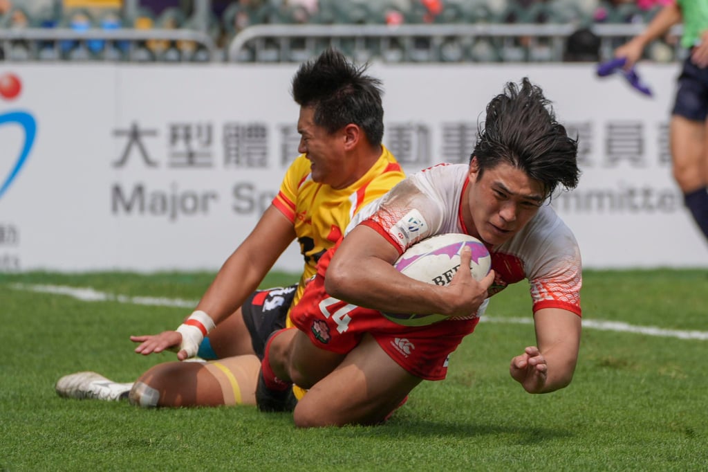 Japan’s Hayata Taniyama scores a try against China at this year’s Hong Kong Sevens. Photo: Eugene Lee