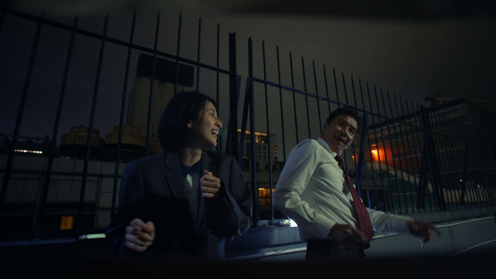 Kuku So and Tai Bo in a still from For Alice.