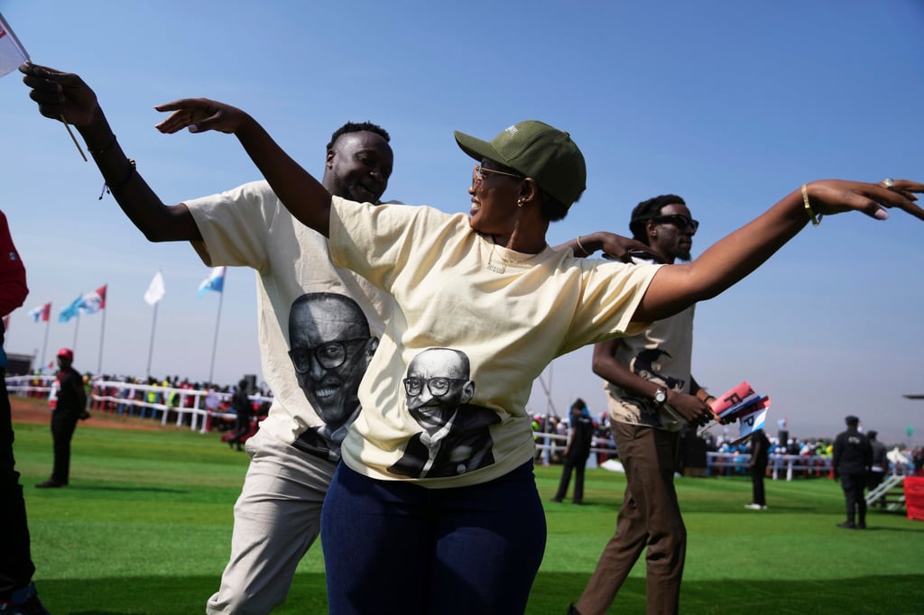 Supporters of Kagame dance during a campaign rally in Kigali, Rwanda. Photo: AP