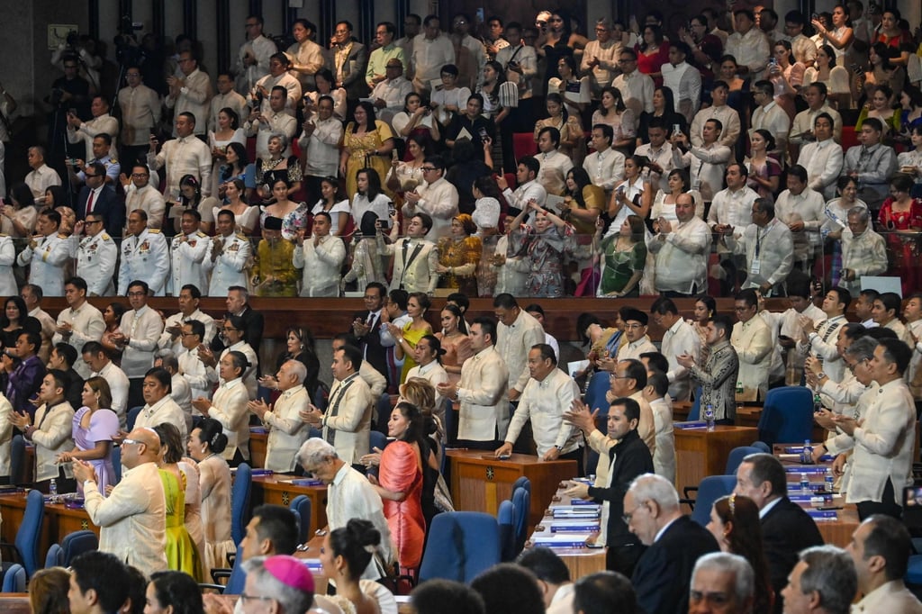 Attendees give a standing ovation for Philippine President Ferdinand Marcos after he delivered the annual State of the Nation Address at the House of Representatives in Manila on Monday. Photo: AFP