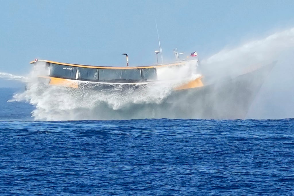 A Philippine resupply vessel is hit by two Chinese coastguard water canons as it tried to enter the Second Thomas Shoal in the disputed South China Sea in March. Photo: AP