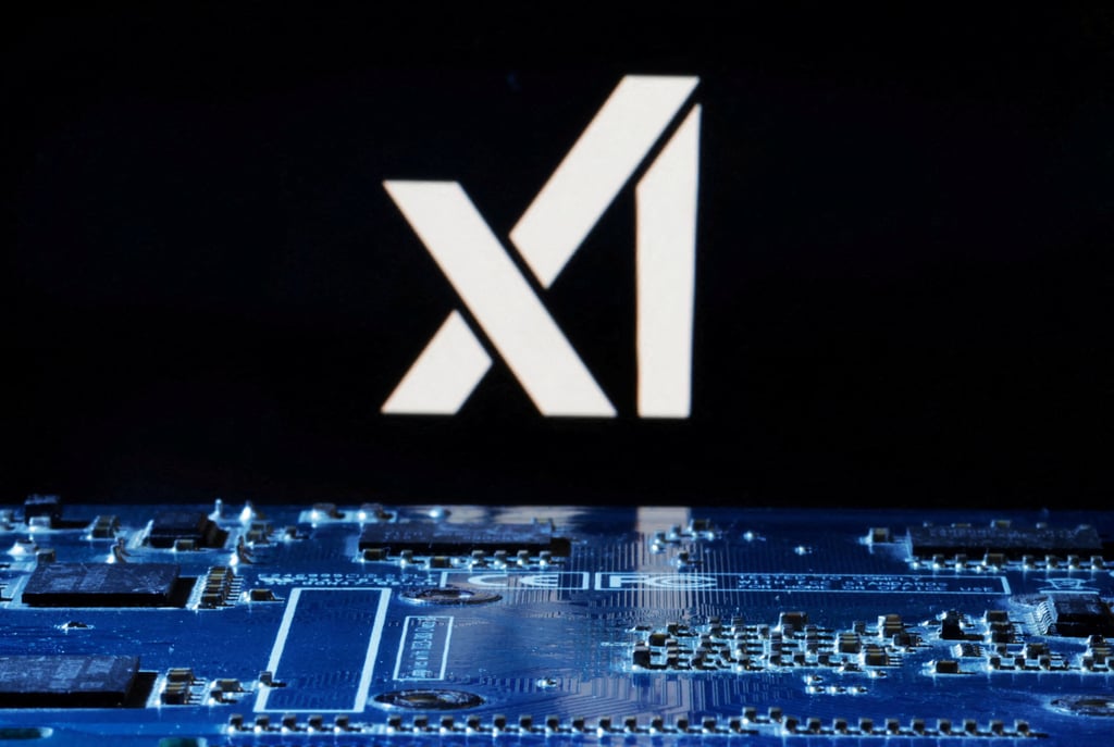 The xAI logo is seen near a computer motherboard in this illustration photo taken January 8, 2024. Photo: Reuters