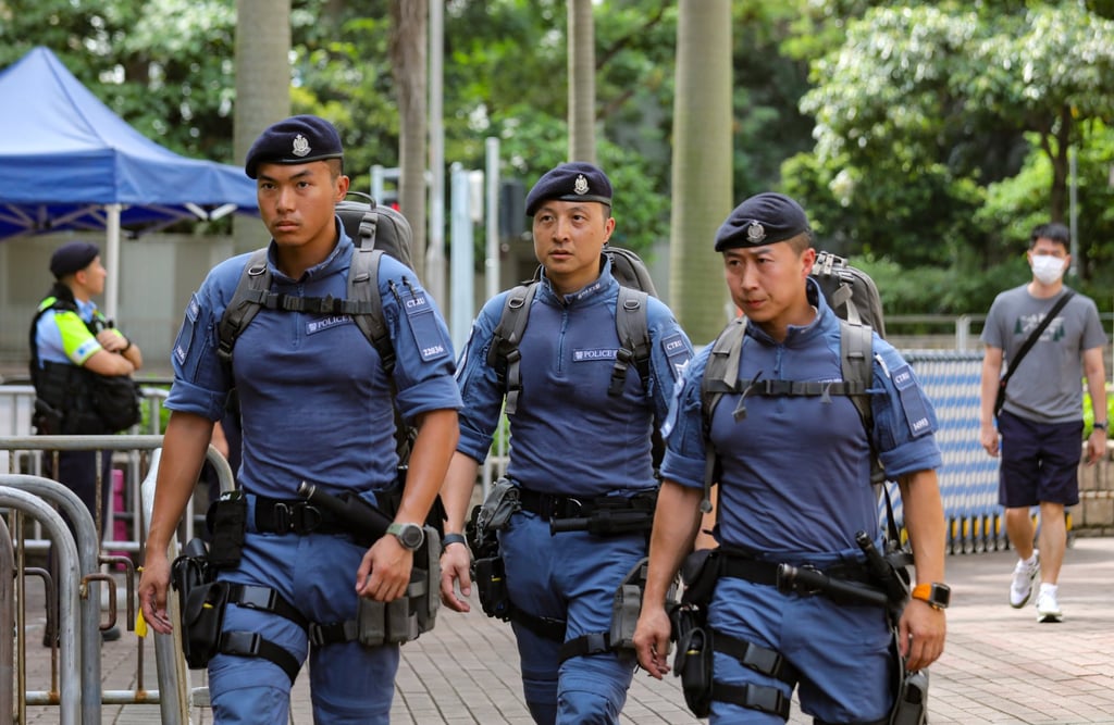 Police patrol the area around West Kowloon Magistrates’ Court on Wednesday as Jimmy Lai’s national security trial resumed. Photo: Xiaomei Chen