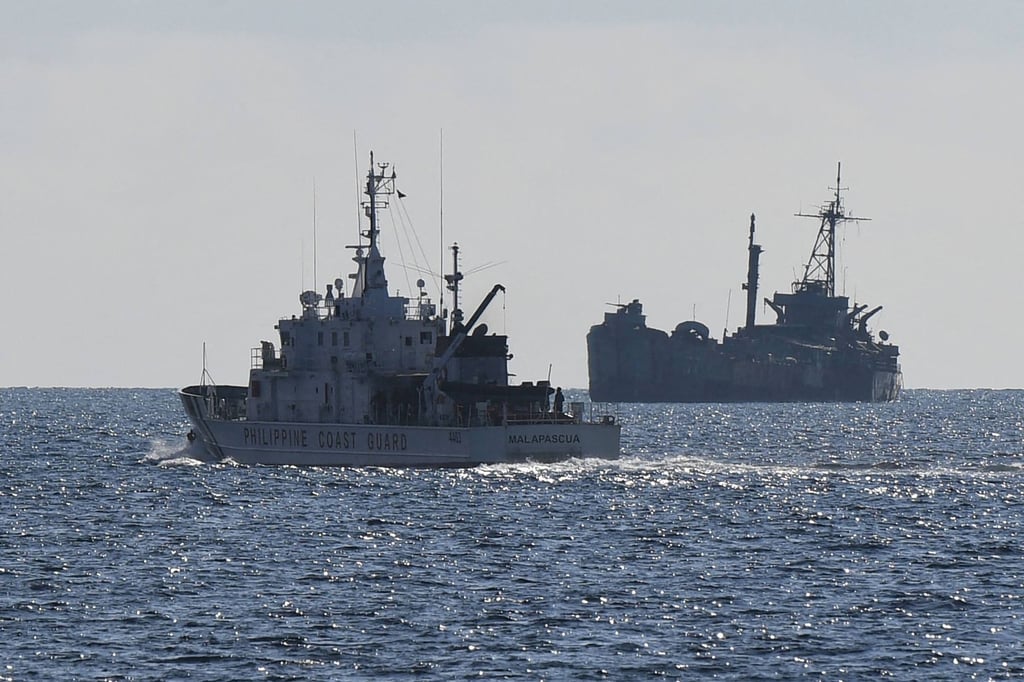A Philippine coastguard vessel approaches the grounded navy ship BRP Sierra Madre at Second Thomas Shoal last year. Photo: AFP