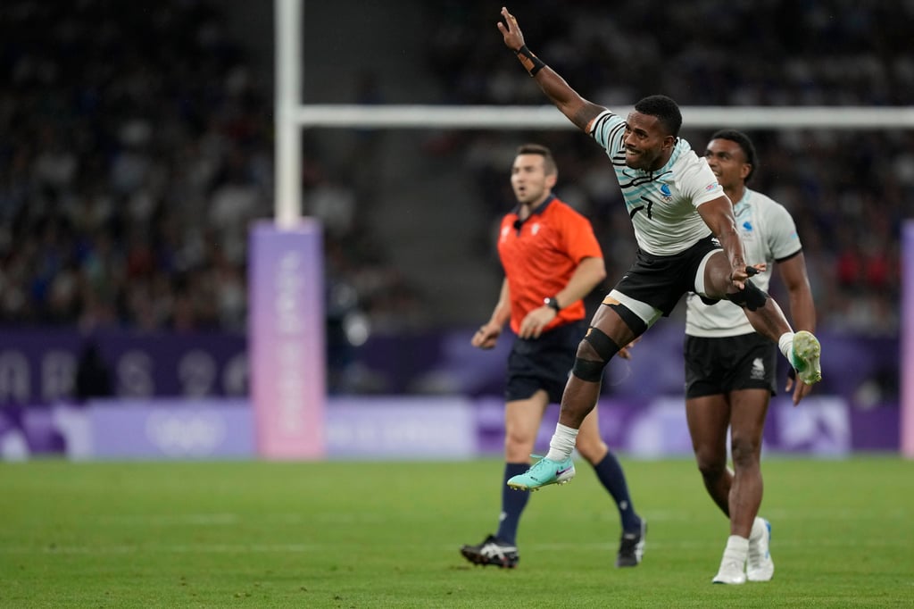 Fiji’s Terio Tamani Veilawa celebrates after their come-from-behind victory over Ireland. Photo: AP Fiji’s Terio Tamani Veilawa celebrates after their come-from-behind victory over Ireland. Photo: AP