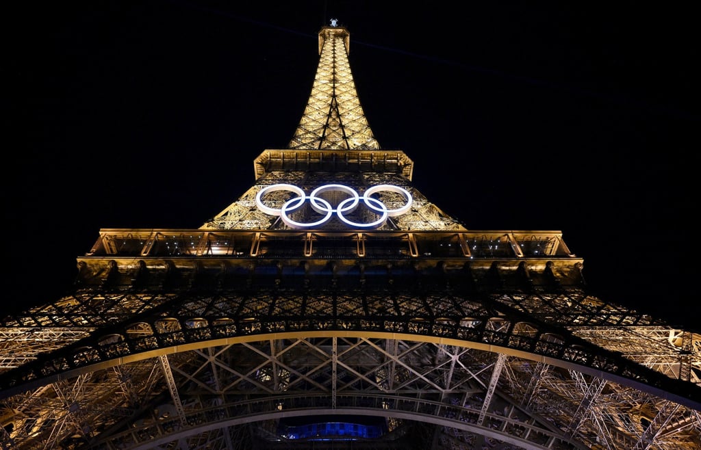 The Olympic rings, proudly displayed on the Eiffel Tower, are made of recycled steel. These Games strive to be the greenest yet, with a carbon footprint half the size of that for the London Olympics in 2012. Photo: EPA-EFE