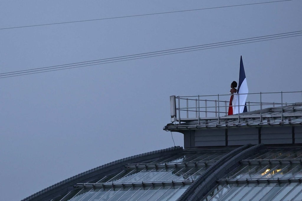 French singer Axelle Saint-Cirel performs the “Marseillaise” on the roof of the Grand Palais during the opening ceremony of the Paris Olympic Games. Photo: AFP