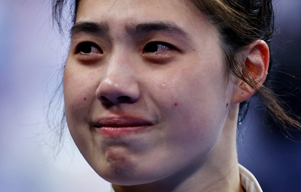 An emotional Yufei Zhang as she receives her bronze medal after the women’s 100-metre butterfly. Photo: Reuters