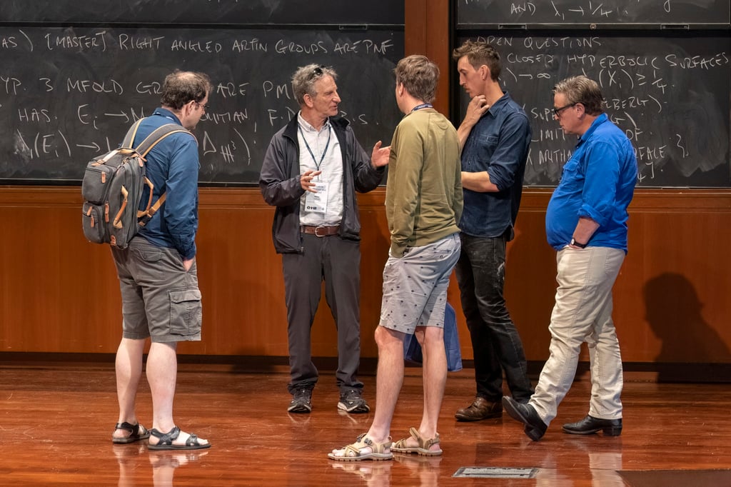 South African mathematician Peter Sarnak (second left) says the 10 years he has spent developing the arithmetic theory of thin groups and the affine sieve has been a collective effort involving many other people. Photo: Maria O’Leary