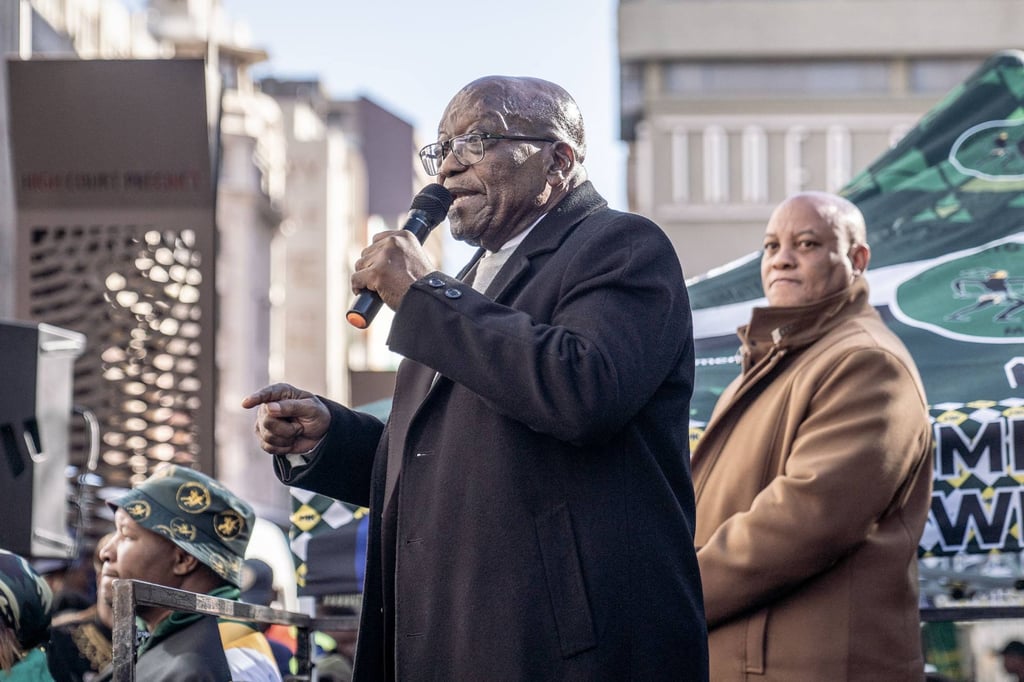 uMkhonto weSizwe (MK) party leader and South Africa’s former president Jacob Zuma addresses his supporters outside the Johannesburg High Court in Johannesburg on June 03. Photo: AFP