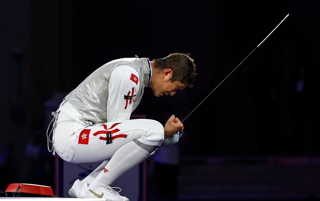 Cheung Ka-long takes a moment to savour his achievement after retaining his Olympic crown. Photo: EPA-EFE
