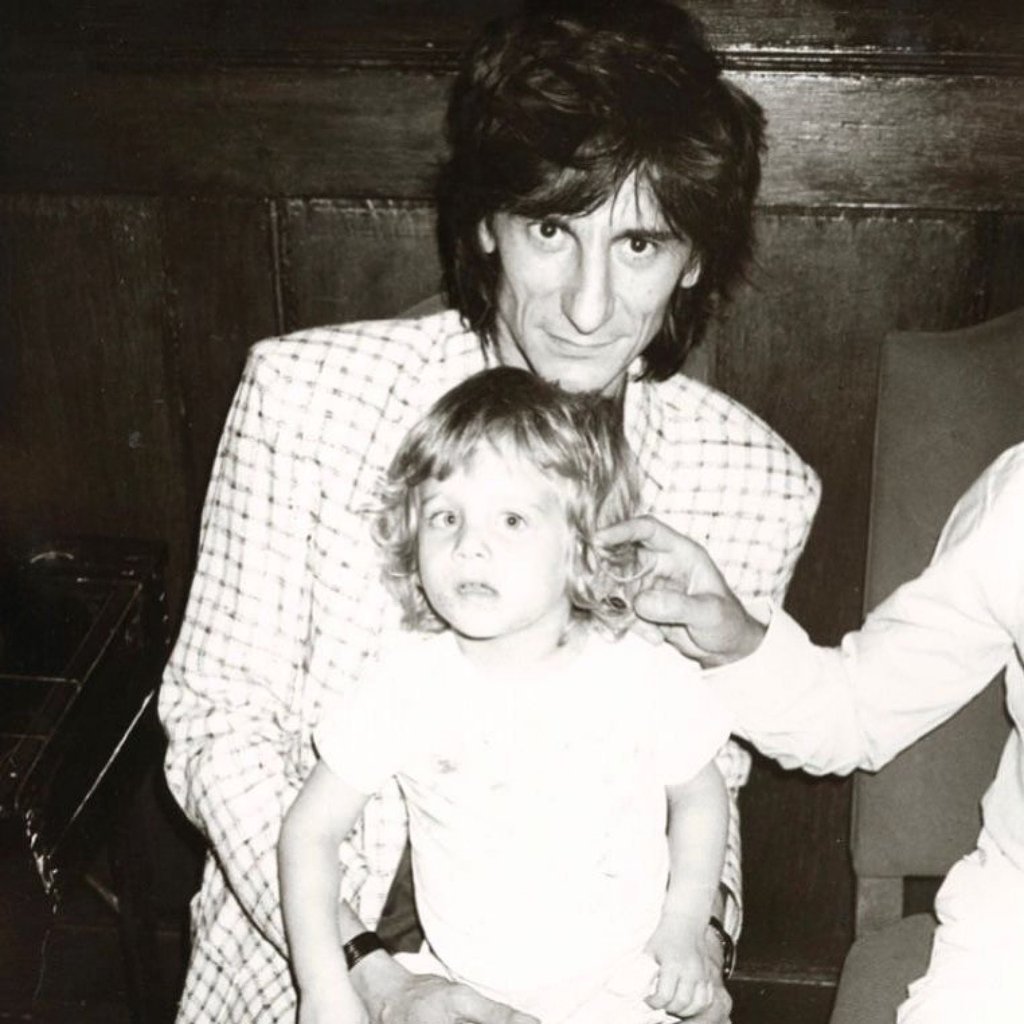 Tyrone Wood as a child with his father, Rolling Stones star Ronnie Wood, in a photo taken by Andy Warhol back in the day. Photo: @tywood__maddox/Instagram
