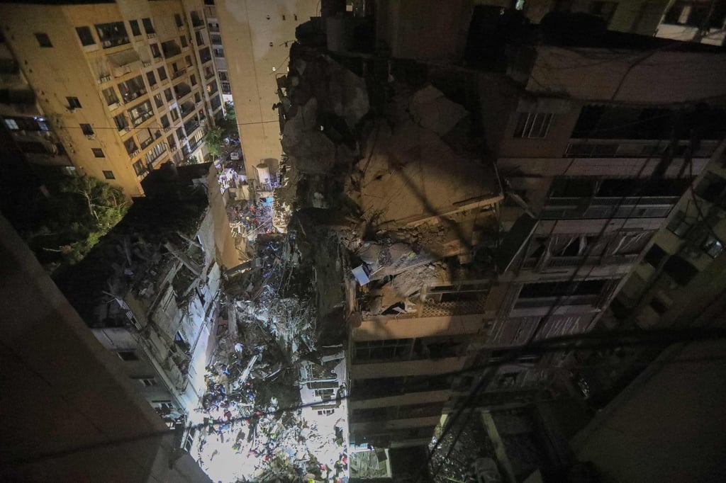 Destroyed top floors of an eight storey building following an Israeli military strike on Beirut. Photo: AFP