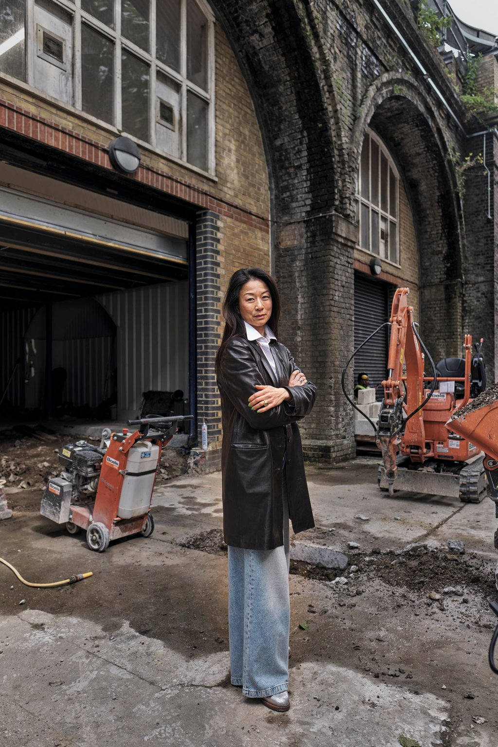 Amy Poon on the site of Poon’s London in Bermondsey with construction work at an early stage. She grew up in a Chinese culinary dynasty in London. Photo: Amy Poon