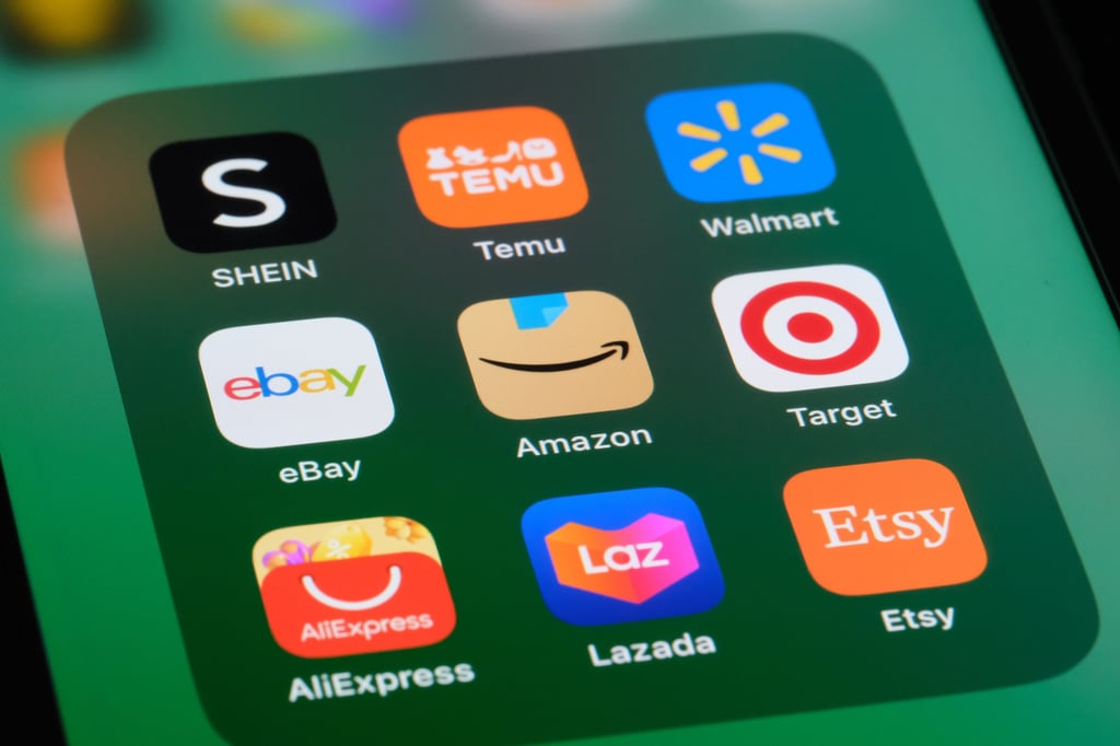 The app icons of Shein, Temu, AliExpress and Lazada are displayed on a smartphone screen alongside those of Amazon.com, eBay, Walmart, Target and Etsy. Photo: Shutterstock
