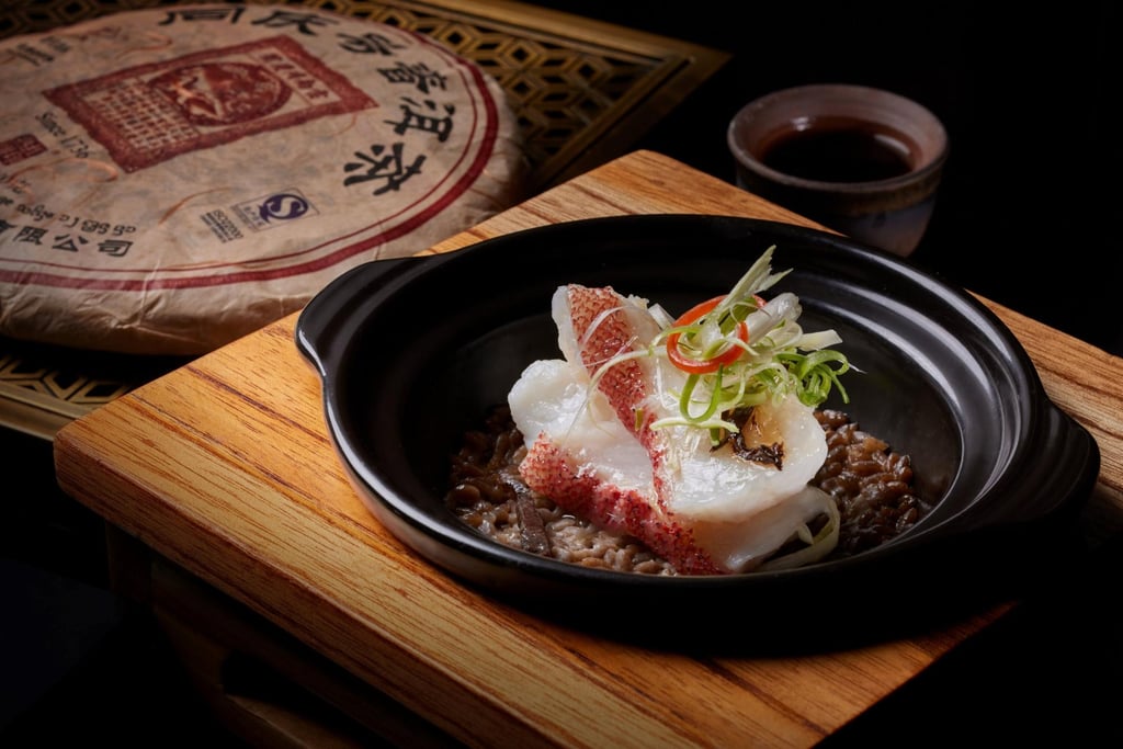 Steamed rock rice with grouper fillet and 25-year preserved vegetables, part of the special Puer menu this August Steamed rock rice with grouper fillet and 25-year preserved vegetables, part of the special Puer menu this August
