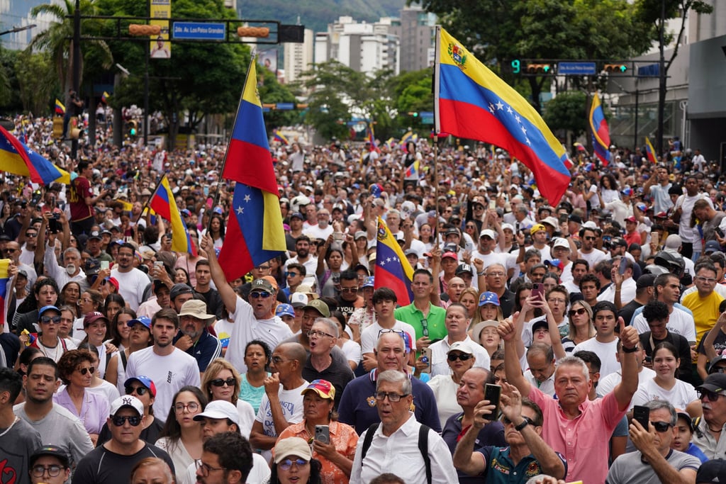 Demonstrators gather to protest election results in Caracas, Venezuela. Photo: Reuters Demonstrators gather to protest election results in Caracas, Venezuela. Photo: Reuters