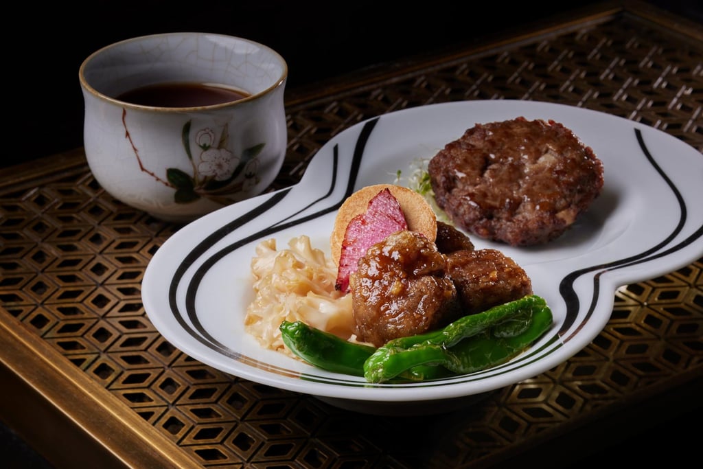 Wok-seared Wagyu patties with mandarin zest and wok-fried Kagoshima Wagyu and cauliflower mushrooms – one of the stand-outs of this special menu Wok-seared Wagyu patties with mandarin zest and wok-fried Kagoshima Wagyu and cauliflower mushrooms – one of the stand-outs of this special menu