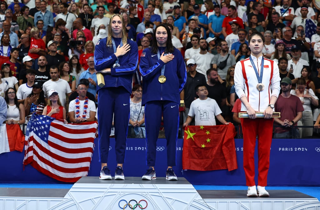 China’s Yufei Zhang (right) won the bronze medal as United States pair Torri Huske (centre) won the gold and Gretchen Walsh the silver in the women’s 100m butterfly. Photo: Reuters China’s Yufei Zhang (right) won the bronze medal as United States pair Torri Huske (centre) won the gold and Gretchen Walsh the silver in the women’s 100m butterfly. Photo: Reuters