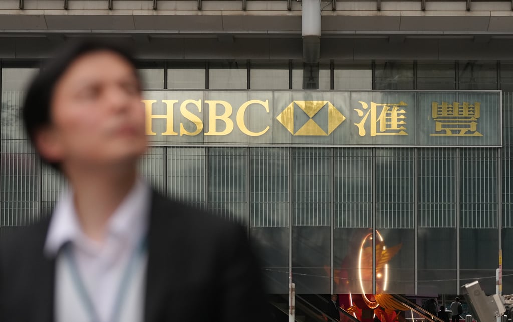 People walk past HSBC’s main building in Central, Hong Kong. Photo: Eugene Lee
