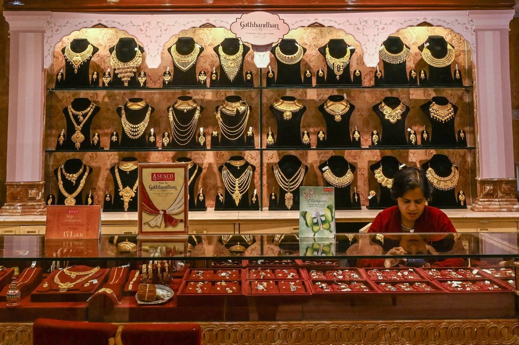 Gold jewellery on display inside a shop in Kolkata in July. Retail gold prices in India are down by around 9 per cent since the federal budget on July 23. Photo: AFP