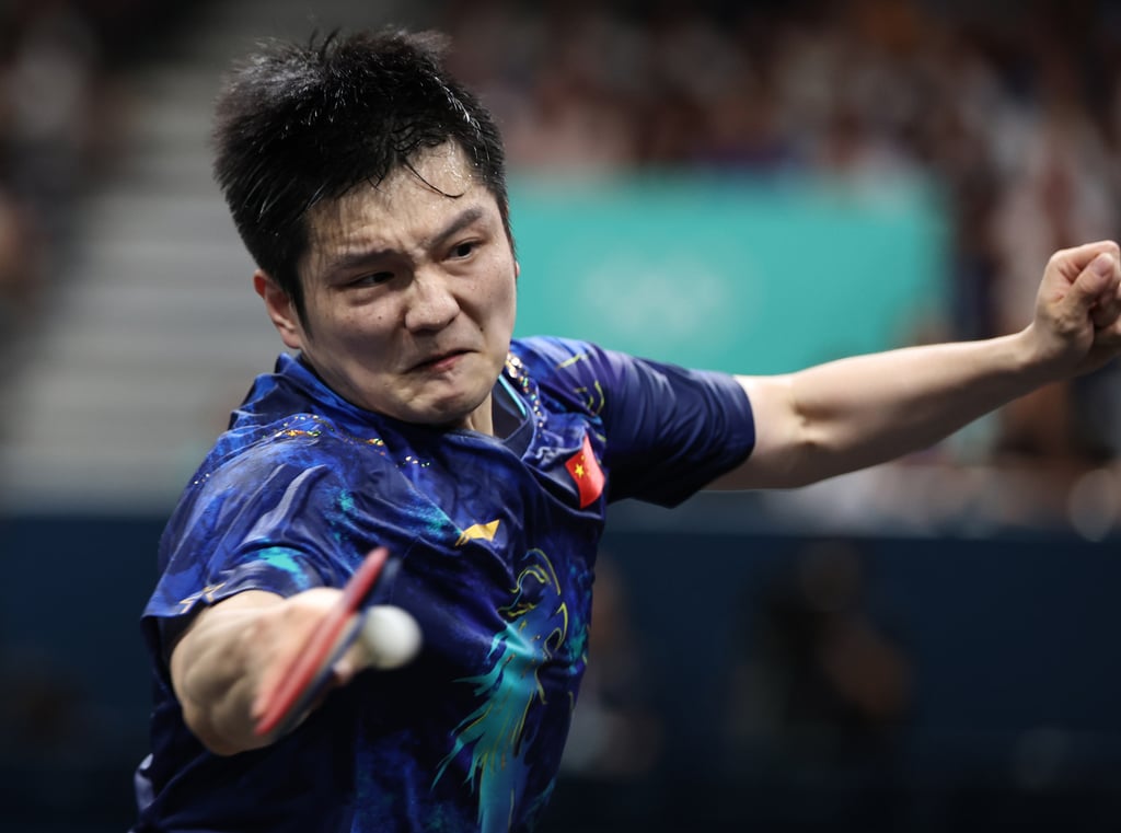 Fan Zhendong of China is forced to scrap to stay in the table tennis men’s singles. Photo: Xinhua