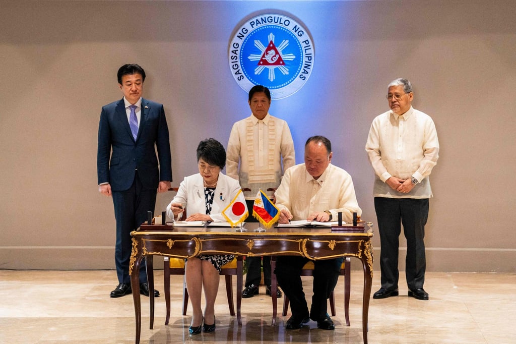 Japan’s Foreign Minister Yoko Kamikawa (front left) and Philippine Defence Minister Gilberto Teodoro sign the Reciprocal Access Agreement in Manila on July 8 to allow the deployment of troops on each other’s territory. Photo: AFP Japan’s Foreign Minister Yoko Kamikawa (front left) and Philippine Defence Minister Gilberto Teodoro sign the Reciprocal Access Agreement in Manila on July 8 to allow the deployment of troops on each other’s territory. Photo: AFP
