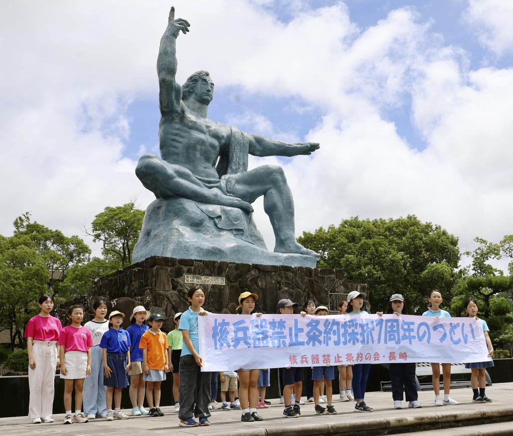 Anti-nuclear group members including survivors of the US atomic bombing of Nagasaki stage a peace rally in the city’s Peace Park on July 7. Photo: Kyodo