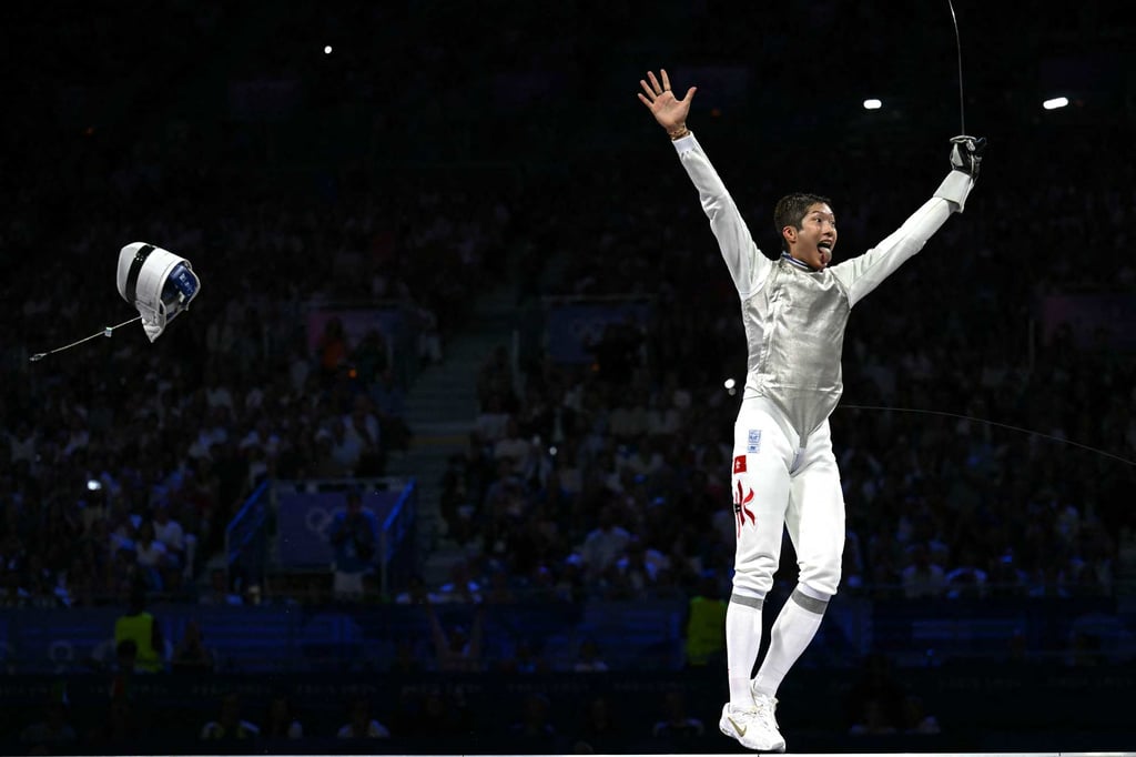 Hong Kong’s Cheung Ka Long celebrates after defeating Italy’s Filippo Macchi in the men’s foil individual gold medal bout. Photo: AFP