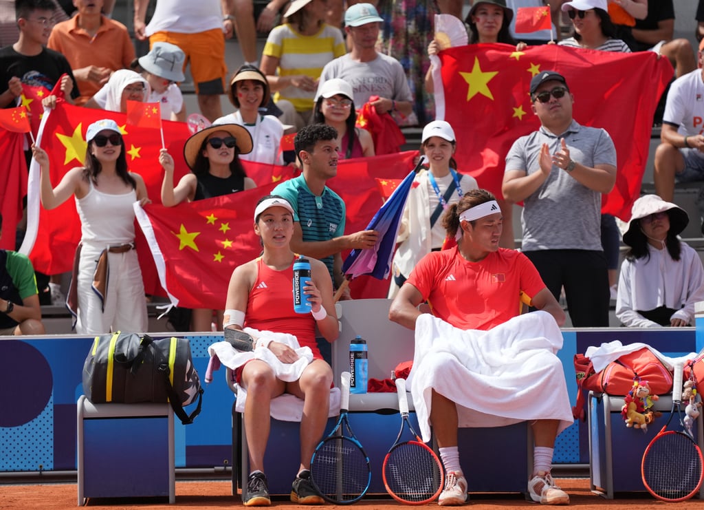 Despite Wang Xinyu (left) and Zhang Zhizhen (right) being a last-minute pairing, they are guaranteed a medal in Paris. Photo: Xinhua