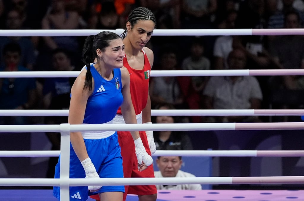 Imane Khelif (right) consoles Italy’s Angela Carini (left) after the Algerian’s Imane Khelif (right) consoles Italy’s Angela Carini (left) after the Algerian’s