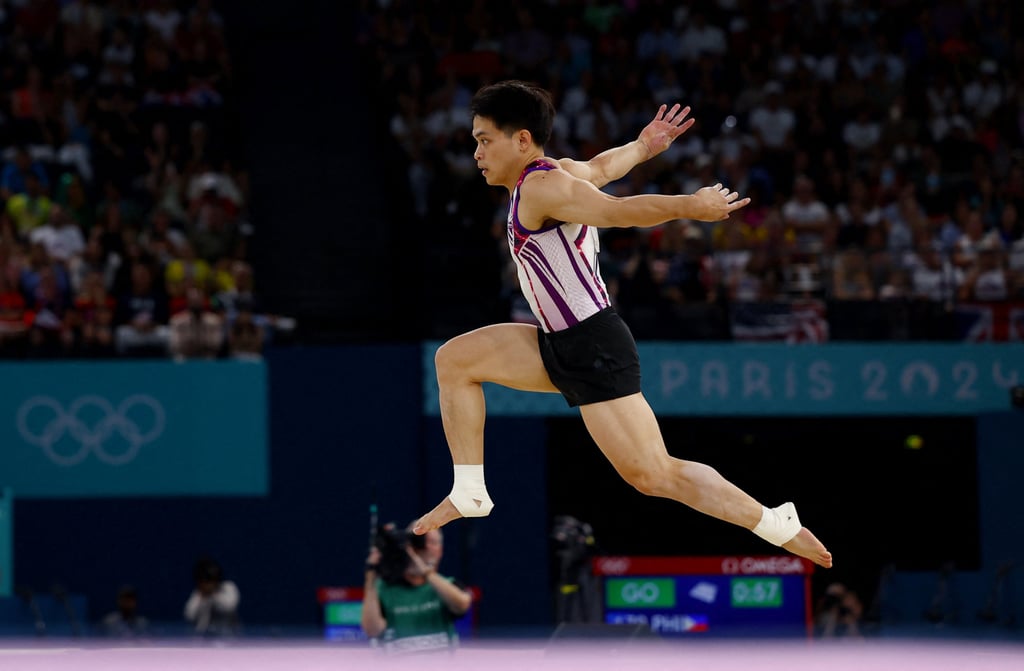 Carlos Yulo performs during the final of the men’s floor exercise. Photo: Reuters