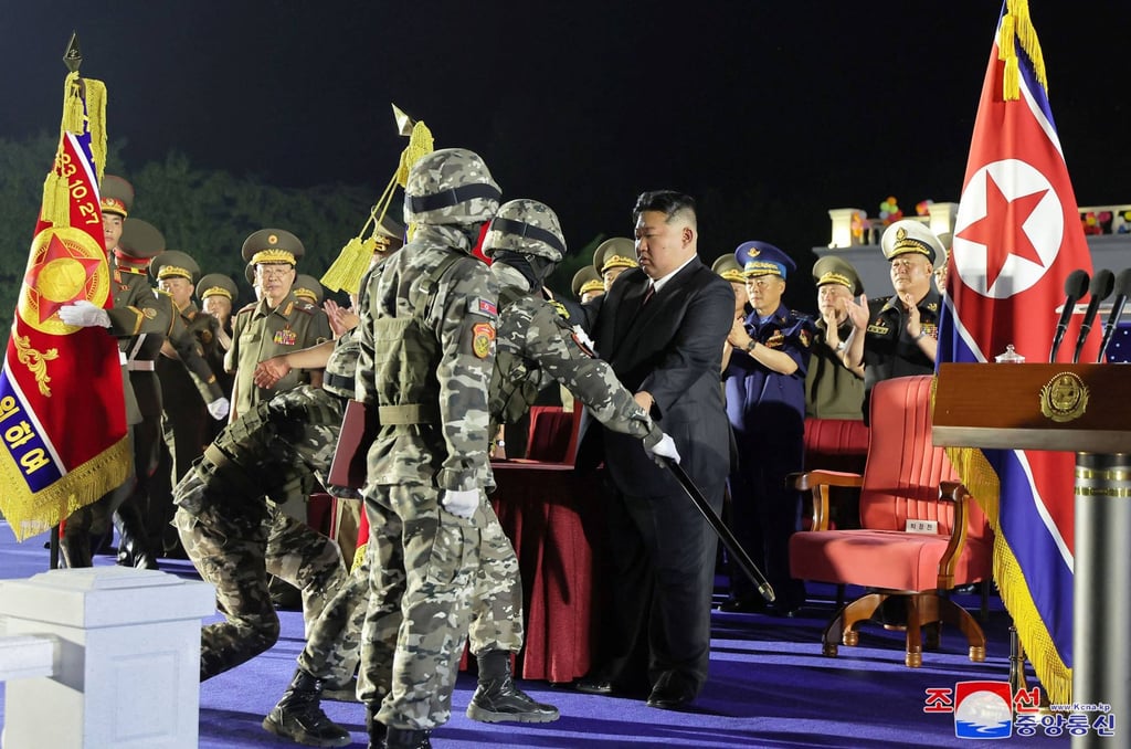 North Korean leader Kim Jong-un at the missile launcher ceremony. Photo: KCNA via AFP