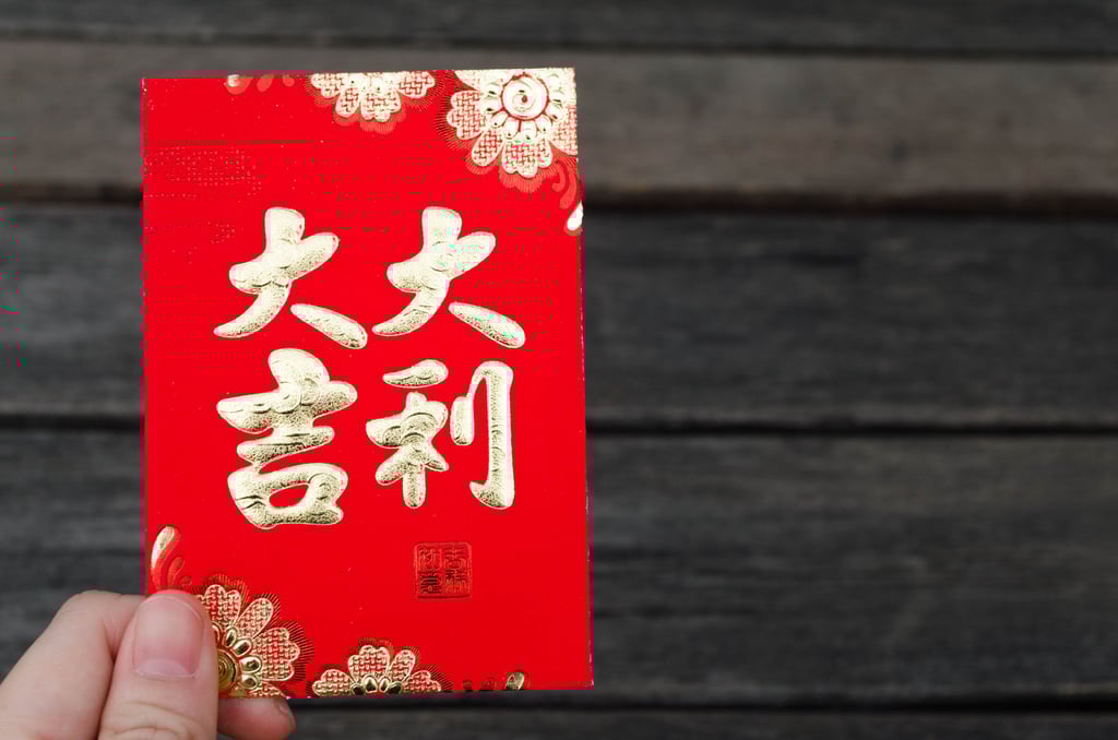 Death scene performers get lai see, or red envelopes, to dispel bad juju after filming. Photo: Shutterstock