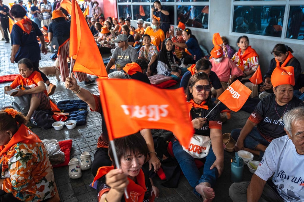 Supporters gather at the Move Forward Party (MFP) headquarters in Bangkok on August 7. Photo: AFP Supporters gather at the Move Forward Party (MFP) headquarters in Bangkok on August 7. Photo: AFP