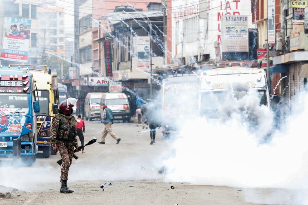Police fire tear gas towards pro-reform protesters. Police also mounted roadblocks on roads leading to the city. Photo: Reuters Police fire tear gas towards pro-reform protesters. Police also mounted roadblocks on roads leading to the city. Photo: Reuters