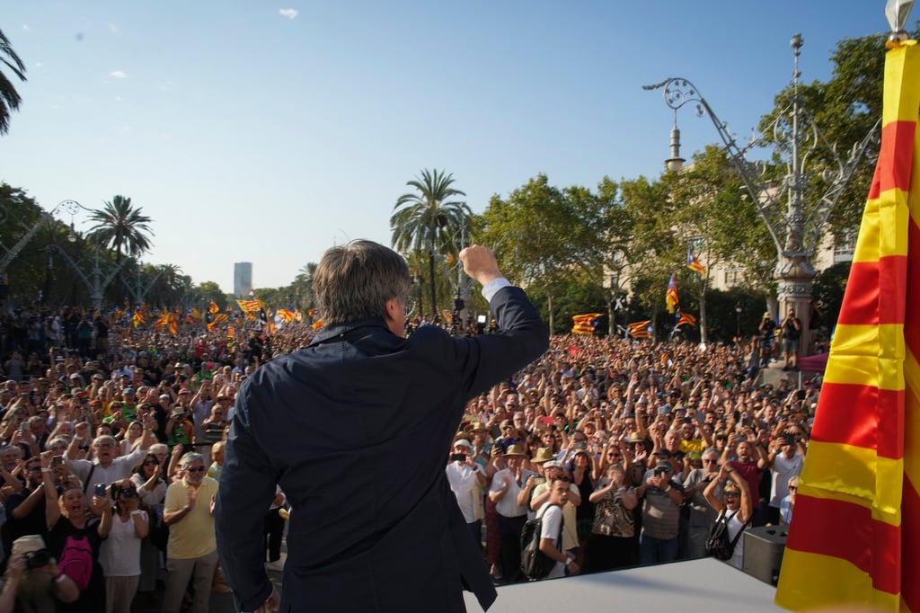 Carles Puigdemont addresses supporters in Barcelona, Spain. Photo: AP Carles Puigdemont addresses supporters in Barcelona, Spain. Photo: AP