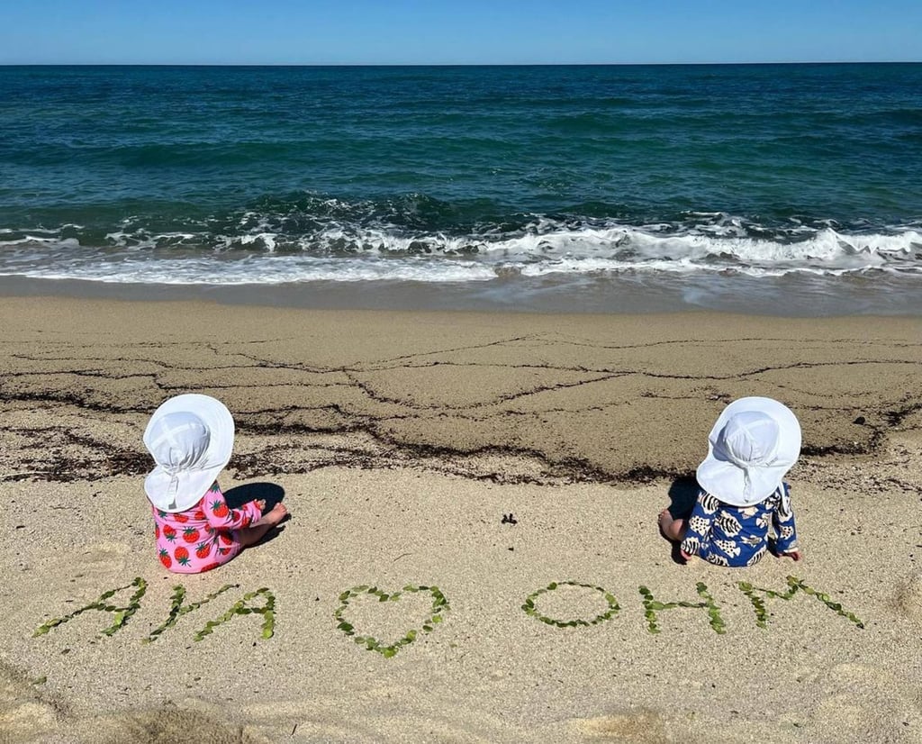 Hilary Swank and Philip Schneider’s twins Aya and Ohm soaking up the beach sun. Photo: @hilaryswank/Instagram