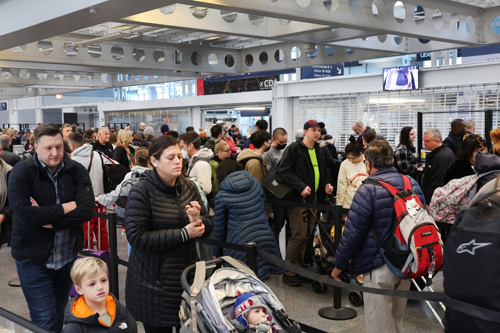 Travellers arrive for flights at O’Hare International Airport in Chicago in December 2022. Photo: TNS