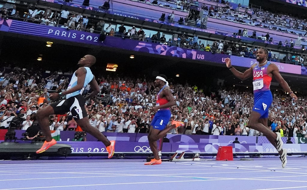 Letsile Tebogo (left) wins the 200m ahead of Kenny Bednarek (second left) and Noah Lyles. Photo: Reuters