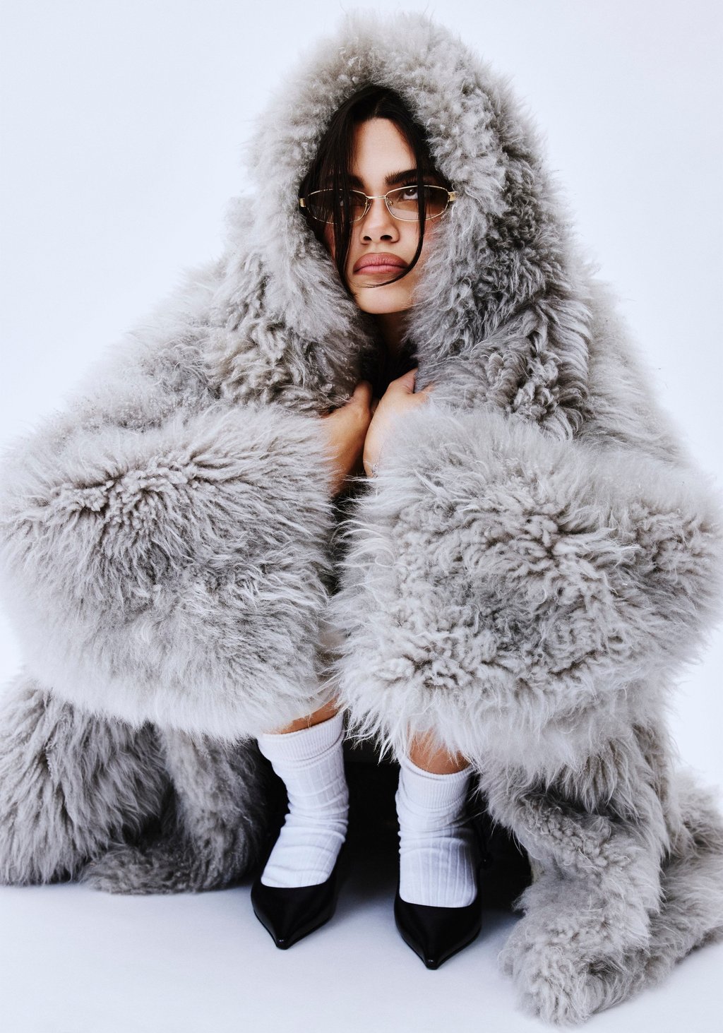 Ariana Greenblatt photographed for Style by Royal Gilbert. Chloé: coat; Pangaia: top; Jimmy Choo: shoes; Bonnie Clyde: sunglasses