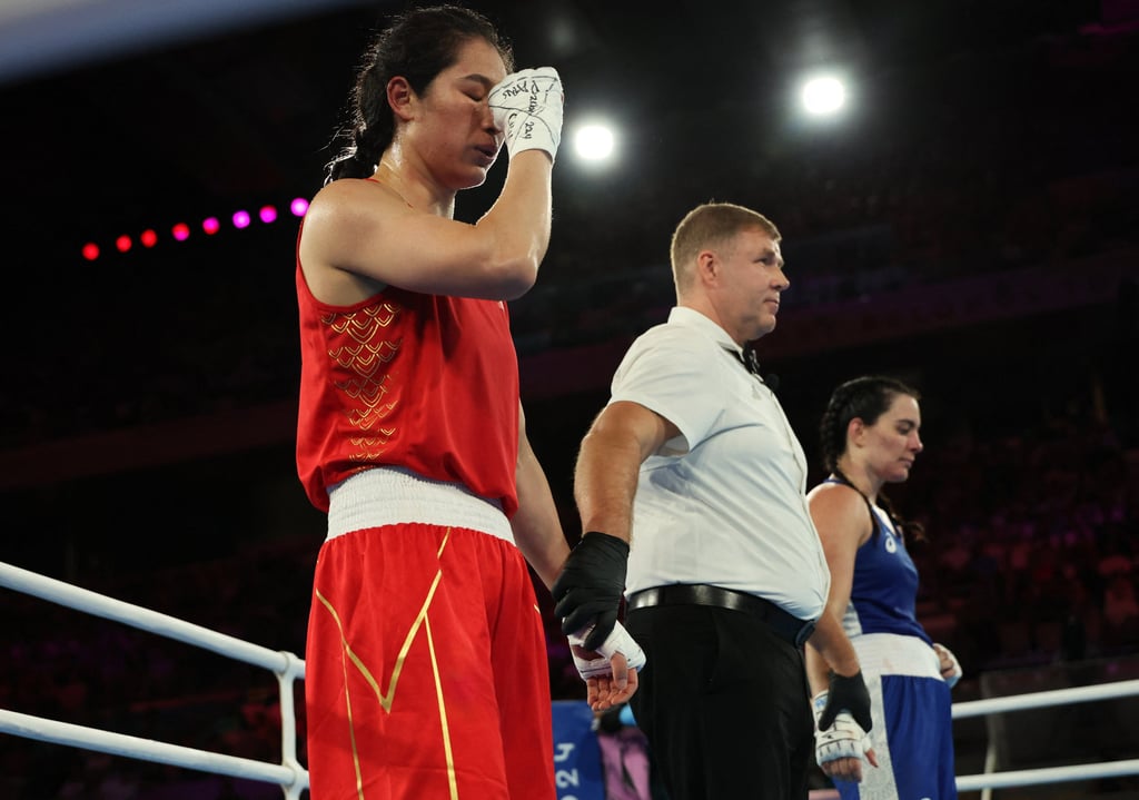 Li Qian (left) believes she is calmer now than she was at the Tokyo Olympics. Photo: Reuters Li Qian (left) believes she is calmer now than she was at the Tokyo Olympics. Photo: Reuters