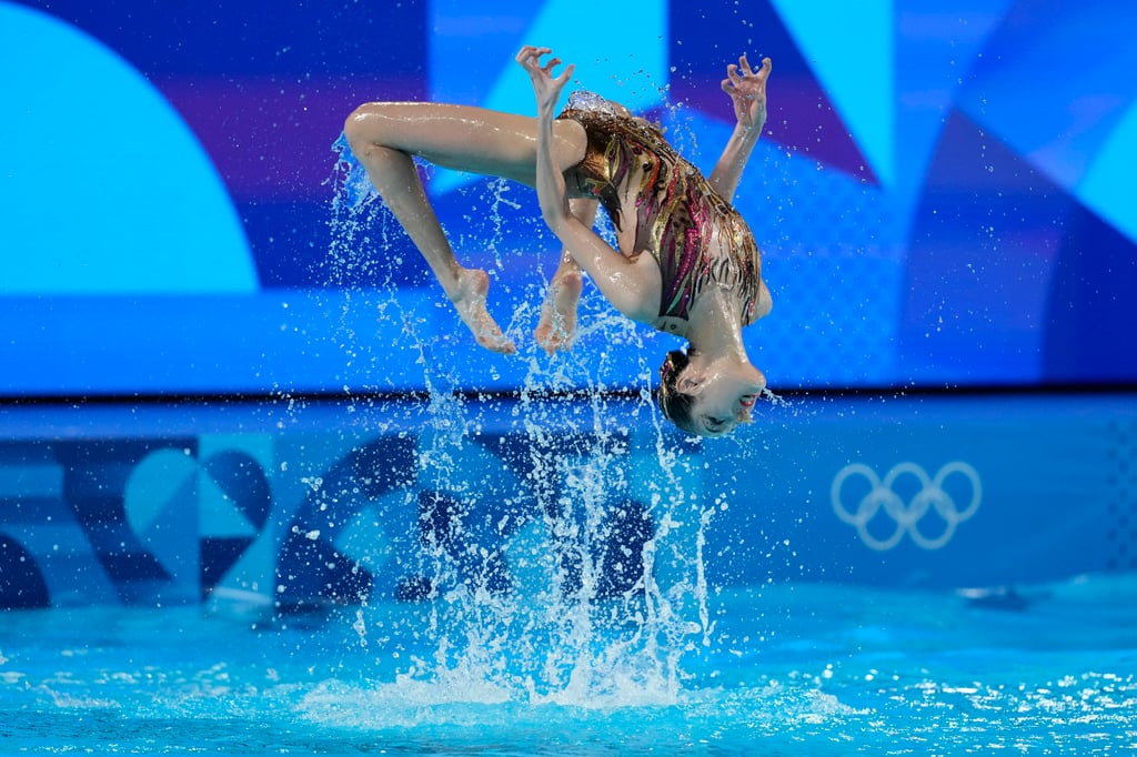 China’s Wang Liuyi and Wang Qianyi compete in the duet free routine of artistic swimming. Photo: AP